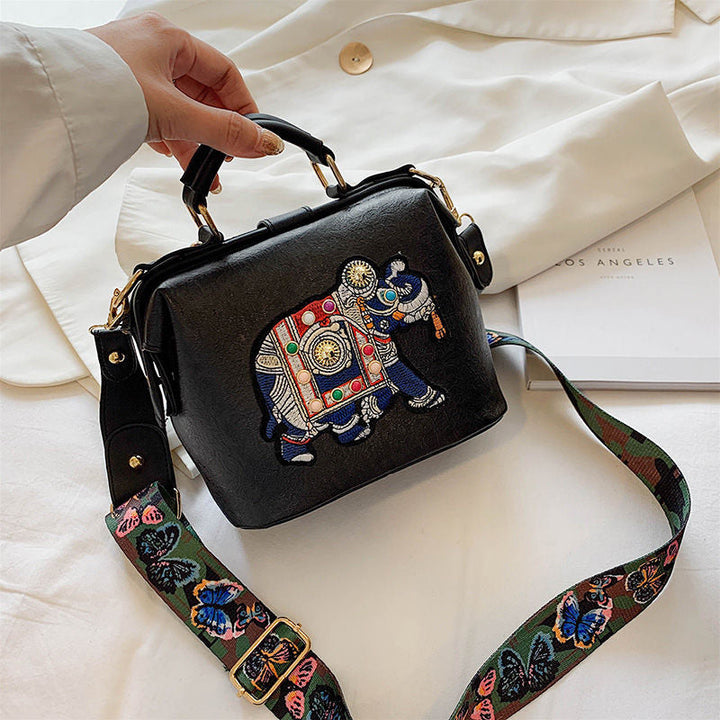 Boho chic women's handbag with beautiful embroidered mandala. Lightweight, multi-use accessory.