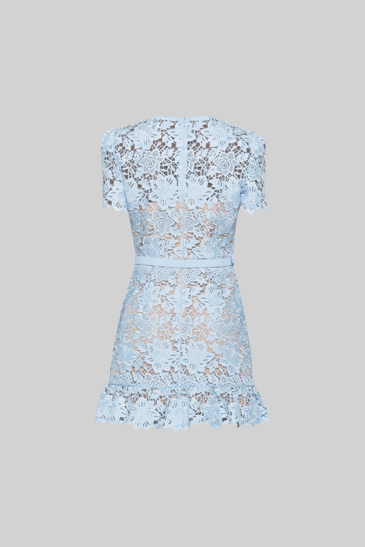 Comfortable women's embroidered summer mini dress, featuring a stylish design and a waist belt.