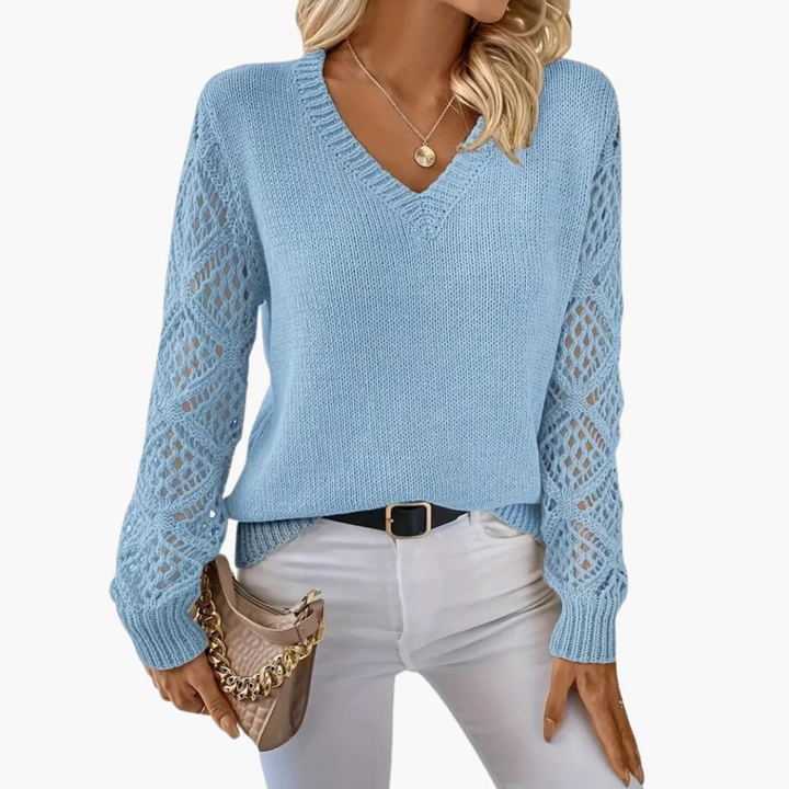 Soft fine knit women's V-neck long sleeve sweater, offering comfort & versatile style for women's fashion.