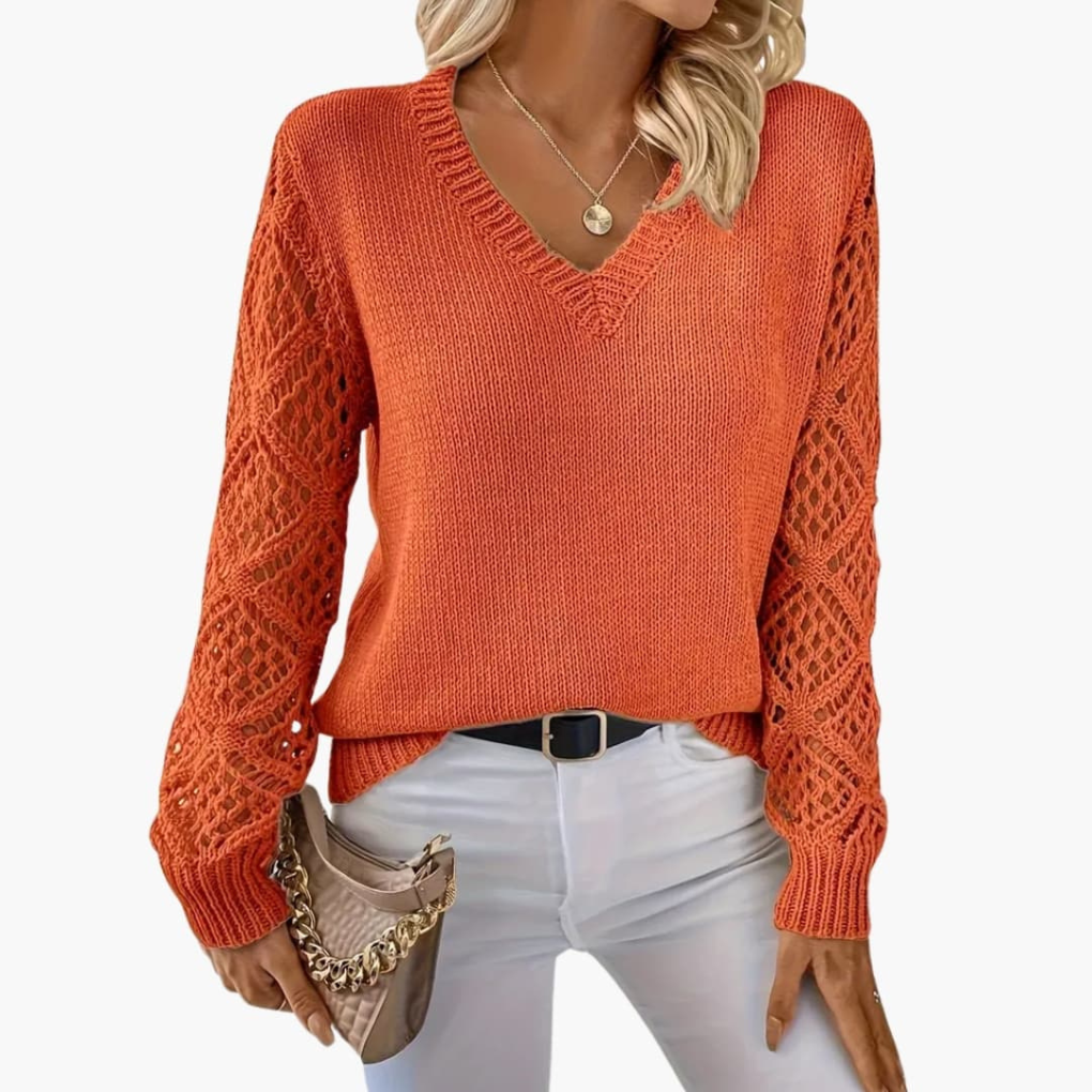Transitional women's fine knit V-neck long sleeve sweater, an elegant and comfortable everyday layering piece.