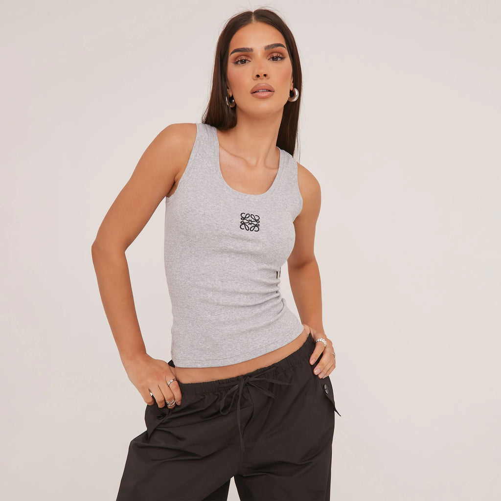 Women's fitted racerback tank top, essential for everyday style & casual wear. Chic sleeveless summer fashion.