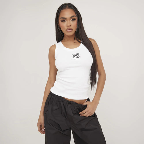 Classic white women's fitted racerback tank top for sleek summer fashion & versatile everyday layering.