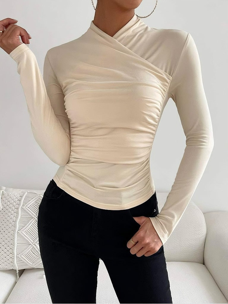 Elegant white wrap neck long sleeve top for women, a stylish fitted blouse ideal for office or casual outfits.