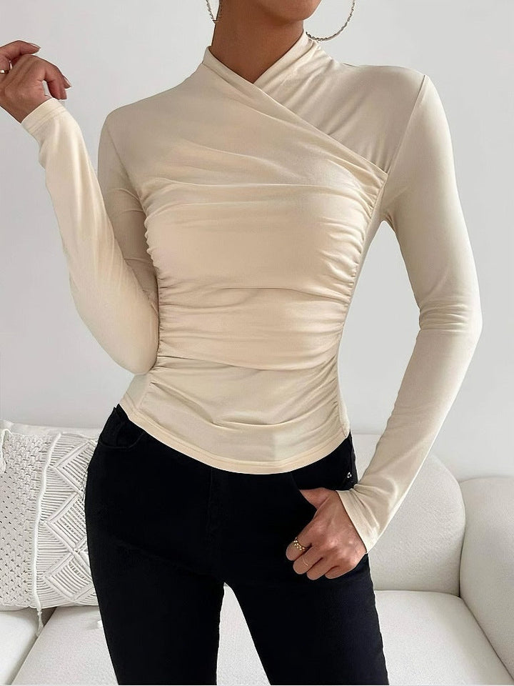 Elegant white wrap neck long sleeve top for women, a stylish fitted blouse ideal for office or casual outfits.
