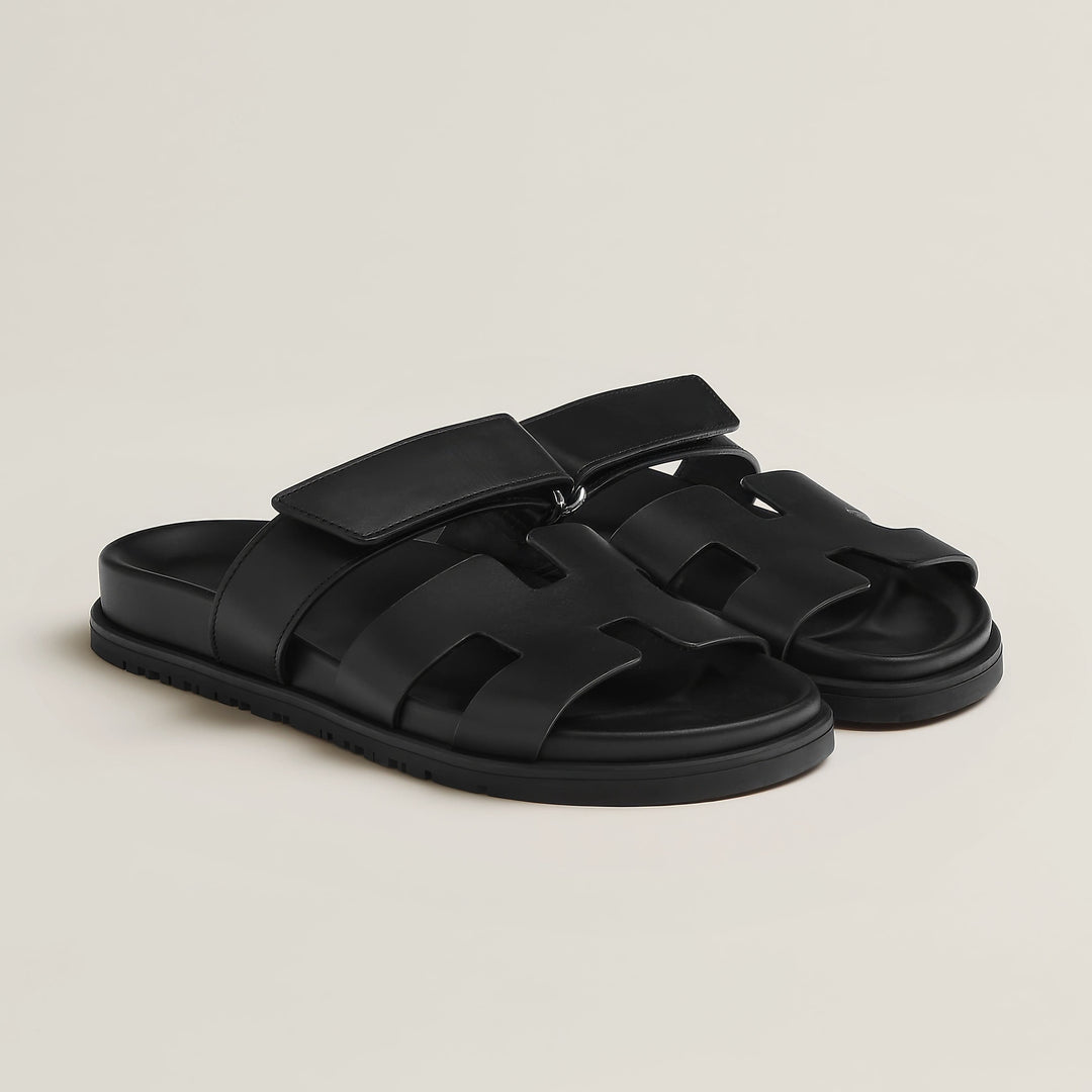 Women's flat slip-on sandals for effortless everyday style. Comfortable open-toe summer shoes.