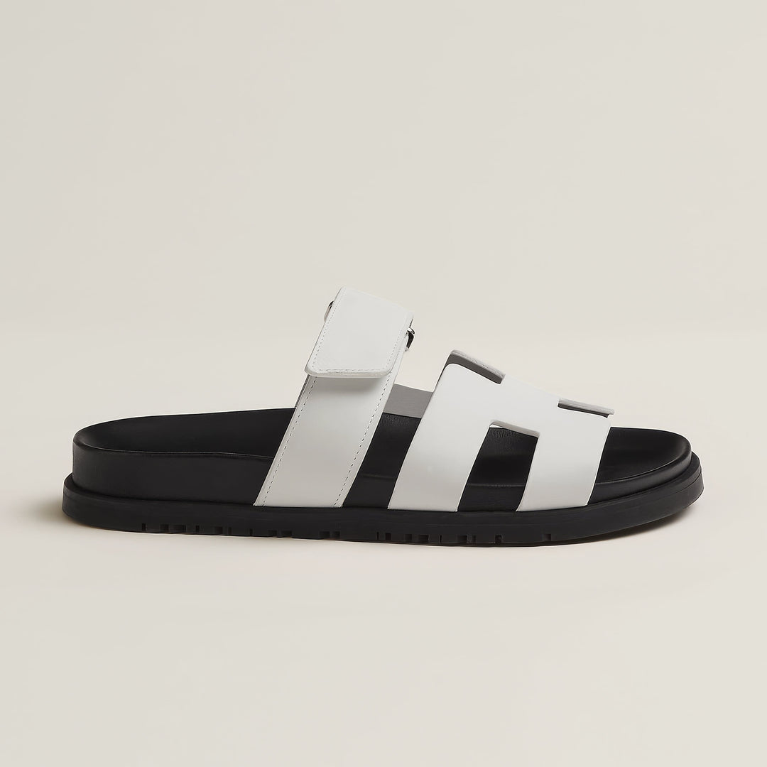 Women's flat open-toe slip-on sandals. Stylish and comfortable for warm weather everyday.