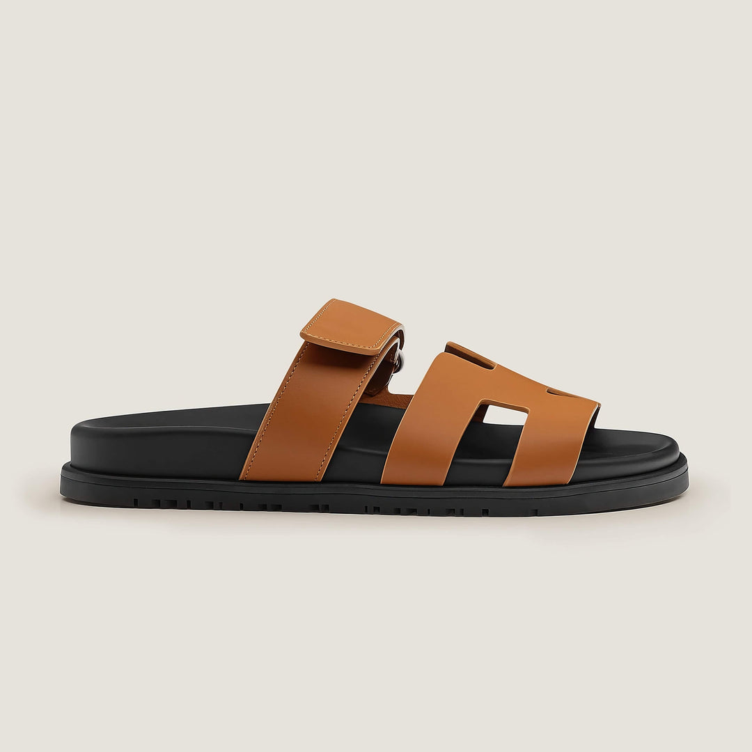 Stylish women's flat sandals, open toe. Effortless slip-on design for everyday summer look.
