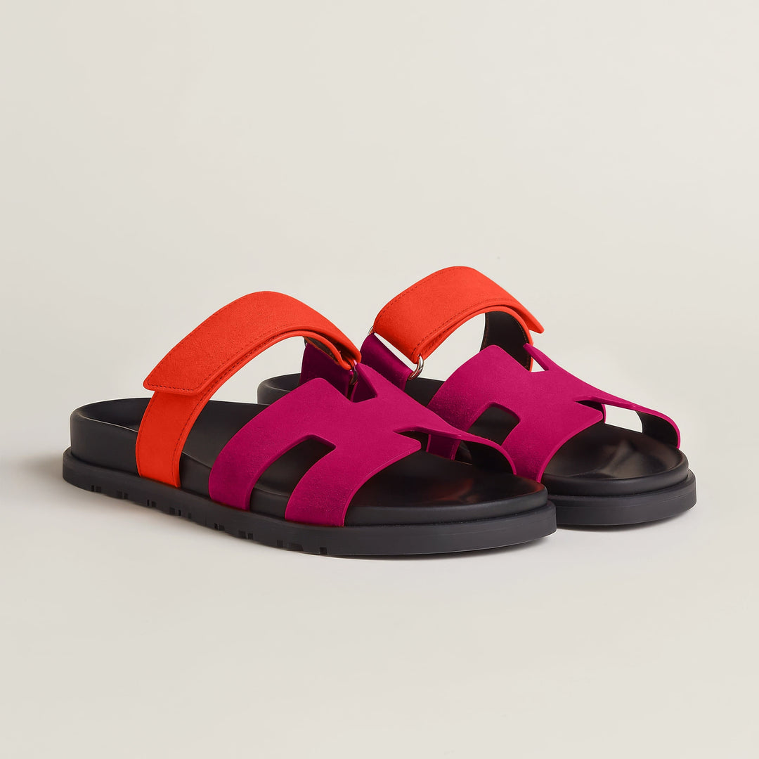 Fashion-forward women's flat sandals. Slip-on open-toe design for casual summer style.