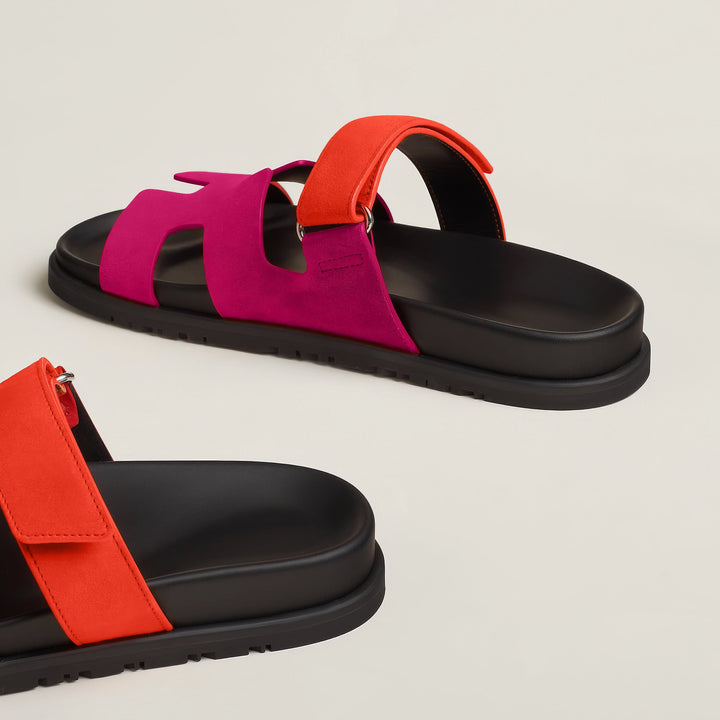 Effortless women's flat slip-on sandals. Comfortable open-toe design for everyday summer fashion.