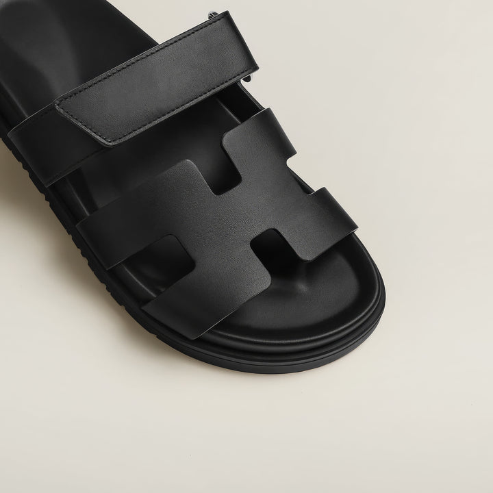 Chic women's flat sandals with cut-out design. Perfect slip-on casual footwear for summer.