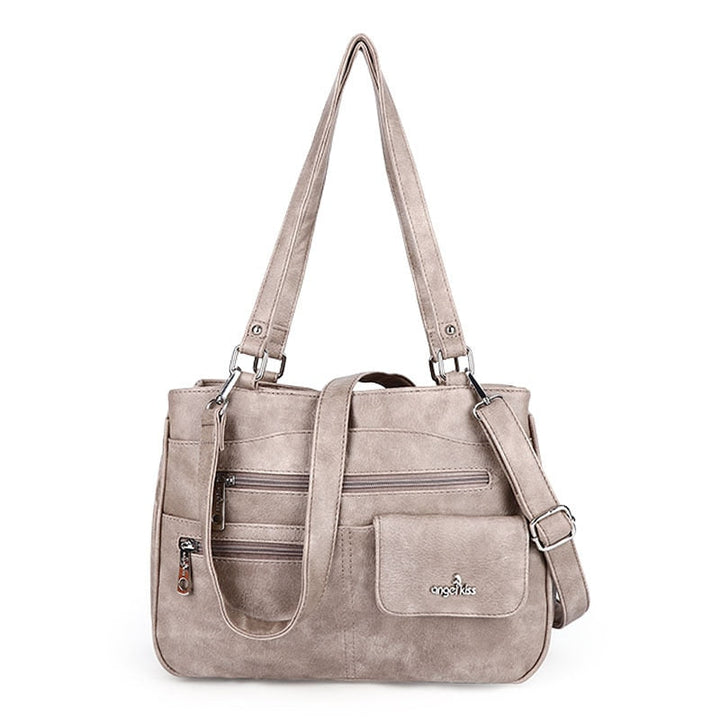 Women's FlexiCarry multi-compartment PU leather crossbody & shoulder handbag.