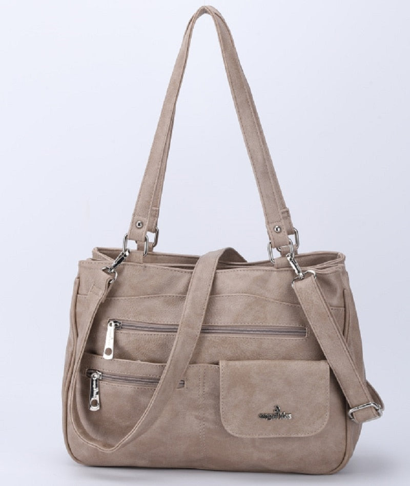 Front view of a solid color PU leather women's shoulder & crossbody handbag.