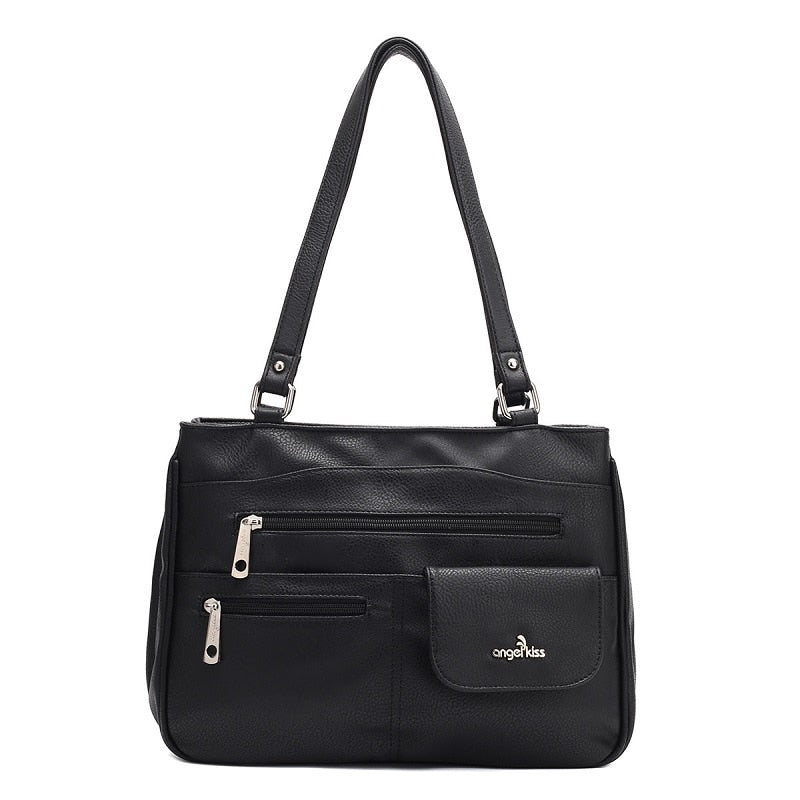 Organized women's multi-compartment crossbody bag for everyday essentials.