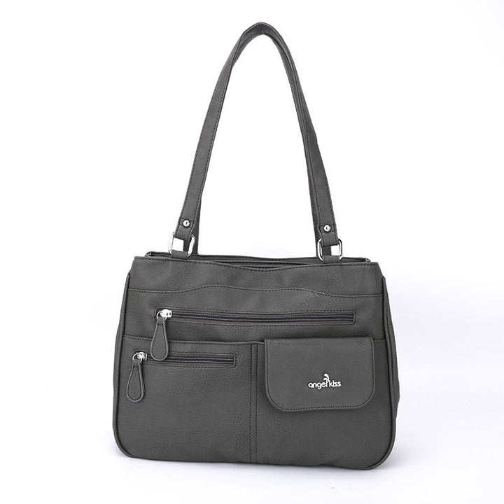 Elegant women's shoulder bag with multiple compartments, a chic fashion accessory.