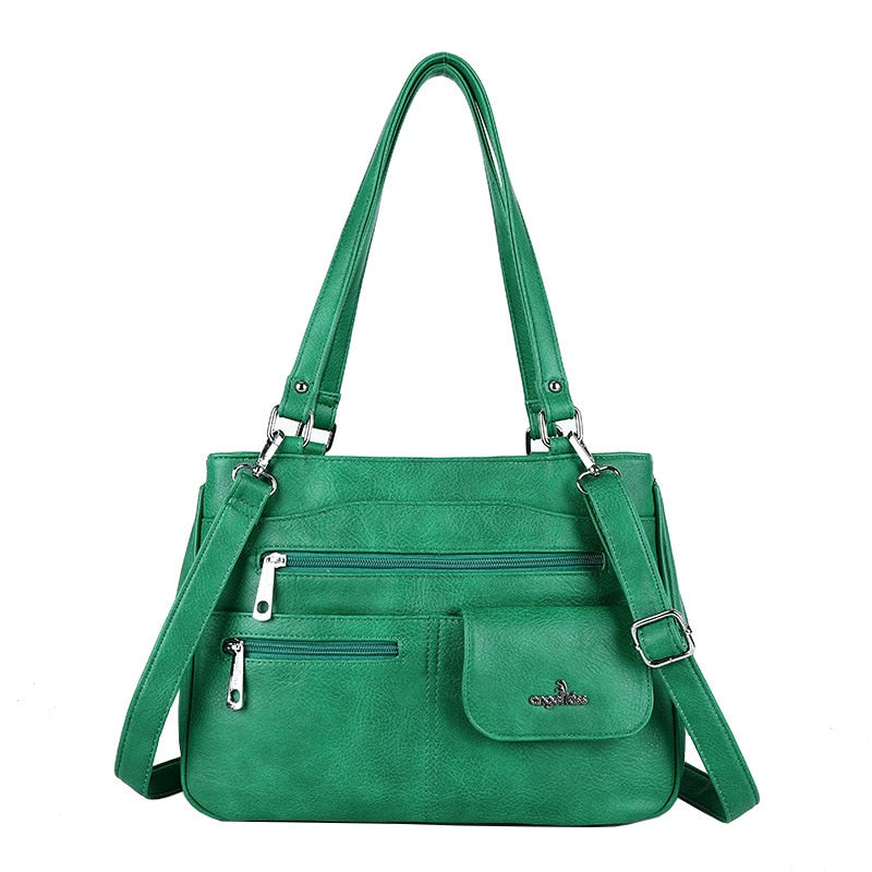 Durable PU leather multi-compartment handbag, a versatile shoulder & crossbody bag.