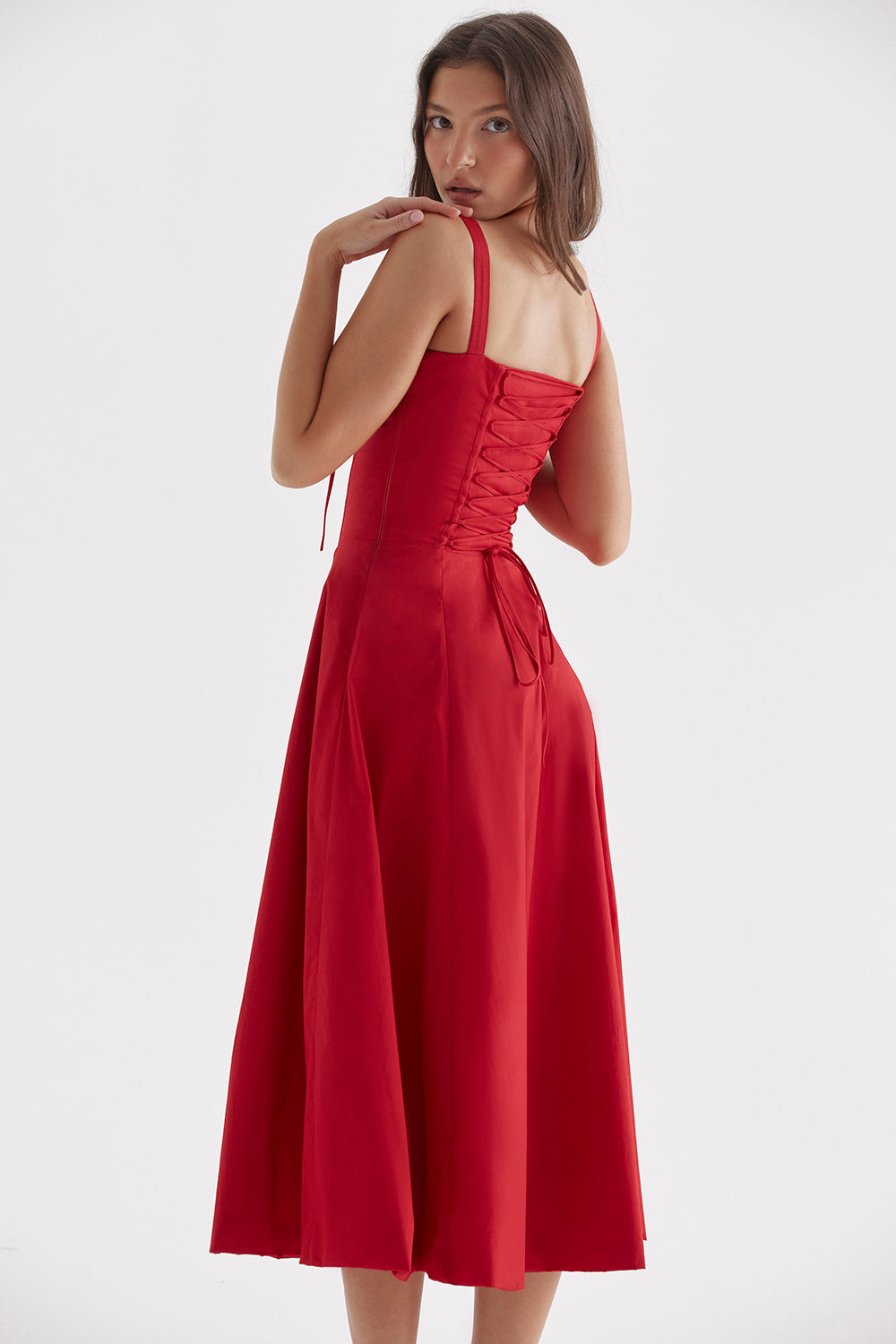 Side profile of a women's floral bustier waist-shaping dress, highlighting its elegant silhouette.