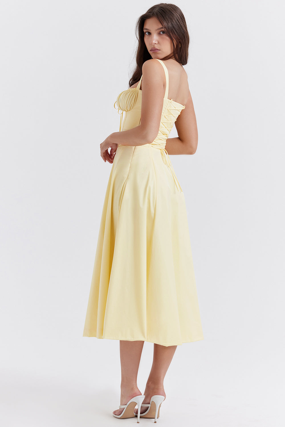 Back view of a flattering women's floral bustier waist-shaping dress, showcasing the design.