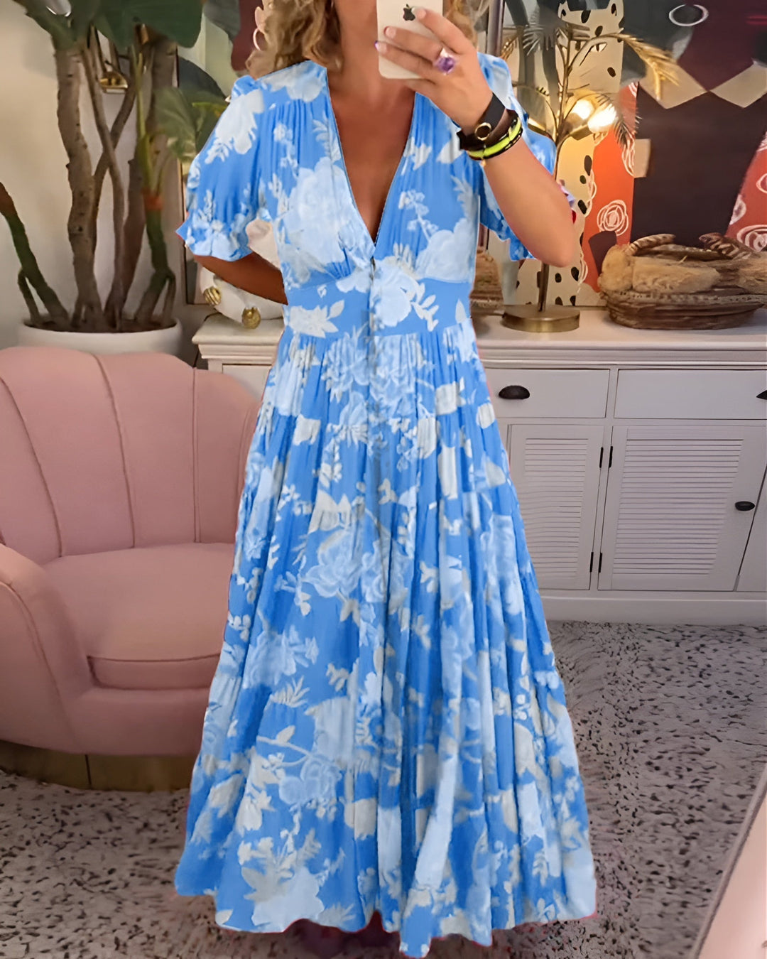 Flattering A-line women's floral print V-neck dress, comfortable midi length with practical pockets.