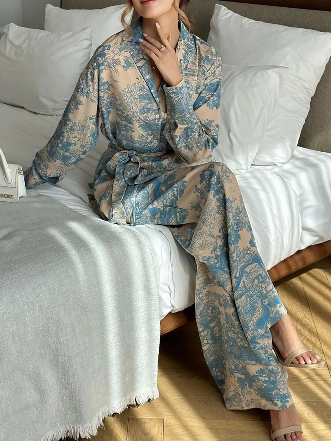 Elegant women's floral co-ord set. Relaxed fit shirt & wide-leg trousers make a chic summer two-piece outfit.