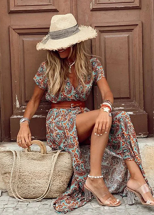 Versatile women's flowing maxi dress with matching belt, embodying elegant bohemian summer fashion.