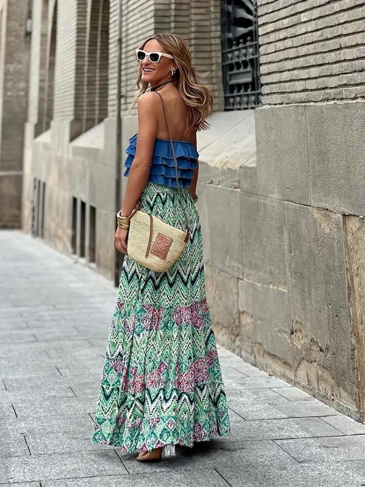 Elegant women's tiered maxi skirt, featuring a flowing bohemian style for summer comfort.