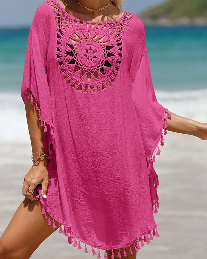 Fashionable women's boho beach cover-up, flowy silhouette, great for summer vacation style.