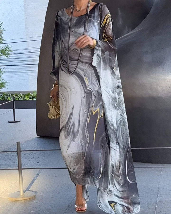 Vibrant yellow women's flowy maxi dress, a comfortable and versatile choice for summer events.