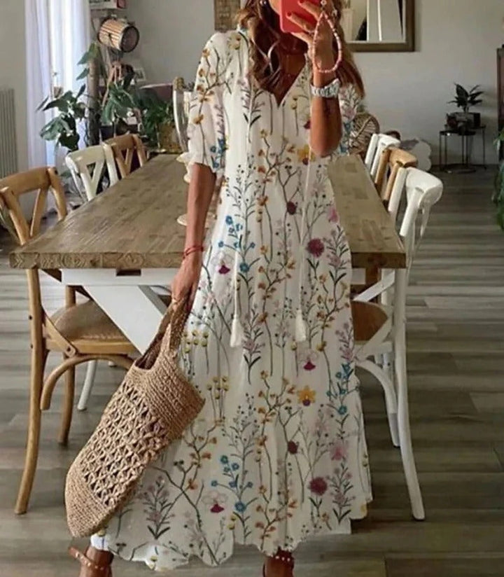 Casual summer boho maxi dress for women, flowy A-line cut with a distinctive leaf & stripe print.