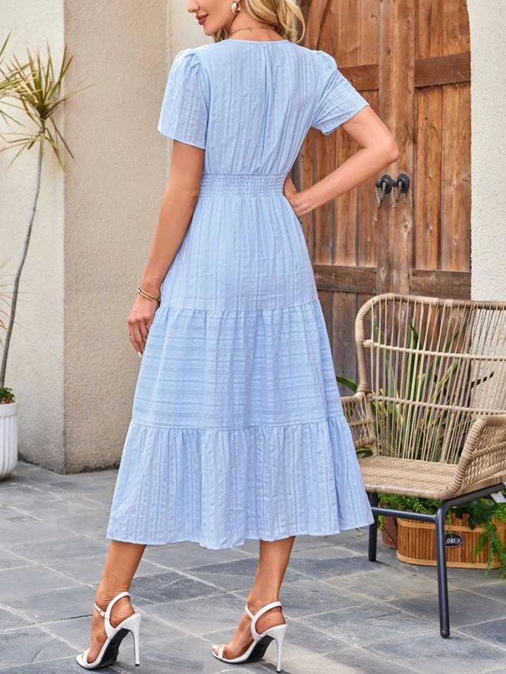 Versatile women's midi dress with pockets, perfect for casual or party events.