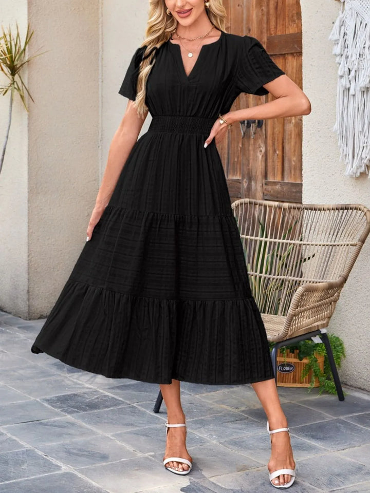 Short sleeve flowy midi dress for women, stylish notched neckline, comfortable.