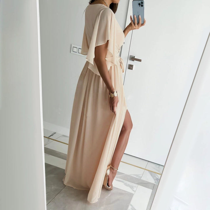 Elegant women's flutter sleeve wrap maxi dress, perfect as a bridesmaid or wedding guest gown.