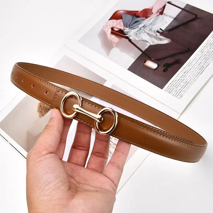 Women's genuine leather accent belt with intricate Celtic charm buckle, perfect for dresses or jeans.