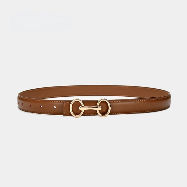 Women's genuine leather jeans belt, embellished with a striking Celtic charm buckle for a unique style.