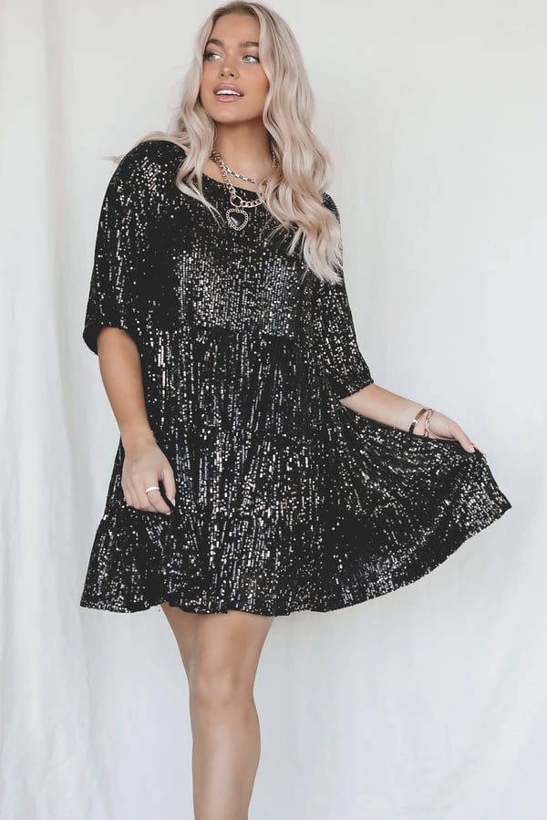 Women's glamorous A-line sequin dress, ShimmerFlow fabric, perfect for parties & evening wear.