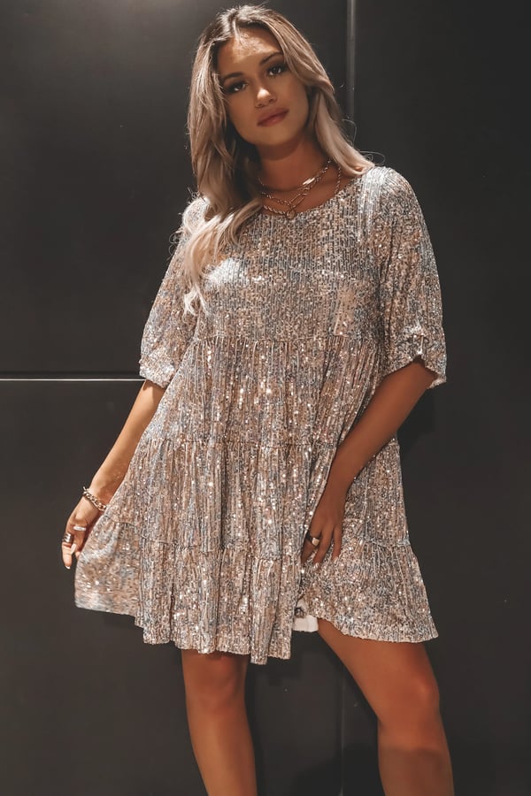 Versatile women's sequin A-line dress, ShimmerFlow, suitable for festive parties & elegant evenings.