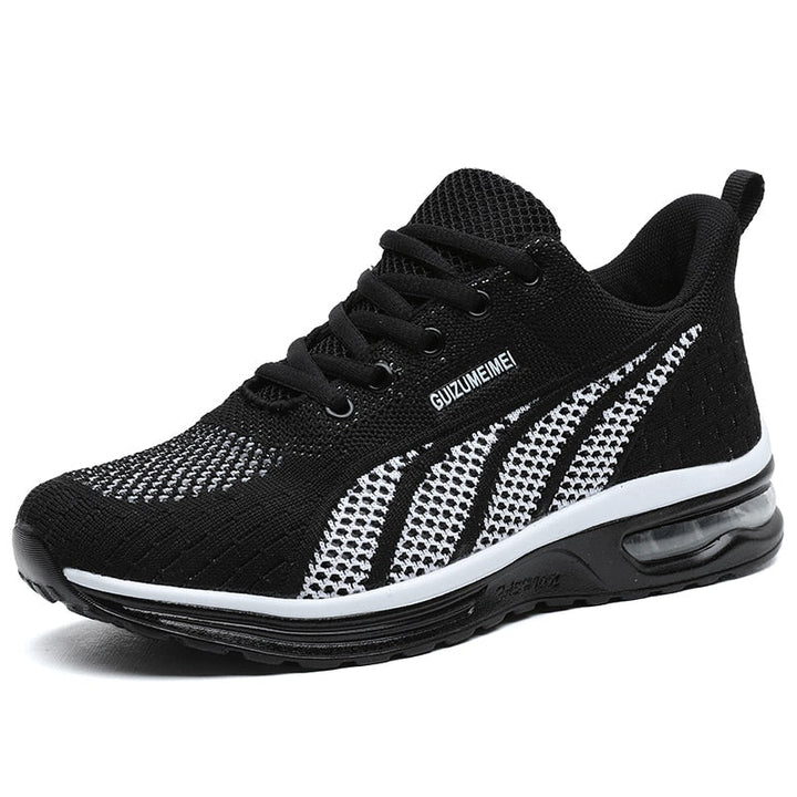 Athletic GlideMotion orthopedic women's sneakers, ideal for walking, with comfortable foot support.