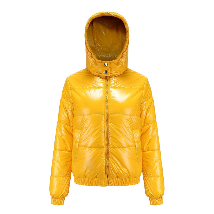 Woman wearing a stylish high-gloss hooded puffer jacket, perfect for cold weather outings.