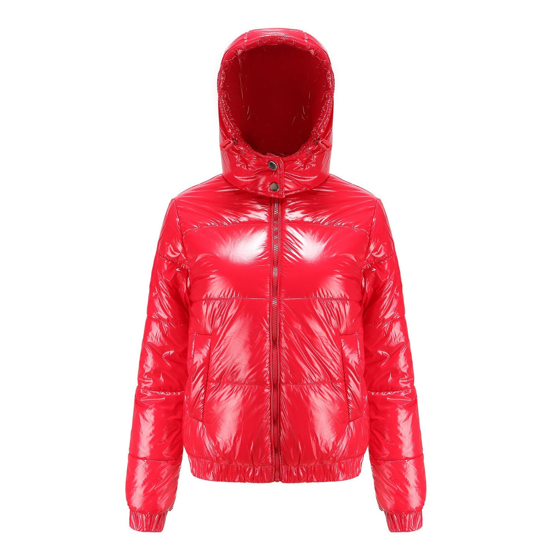 Detailed view of a high-gloss women's puffer jacket with a cozy hood, winter fashion.