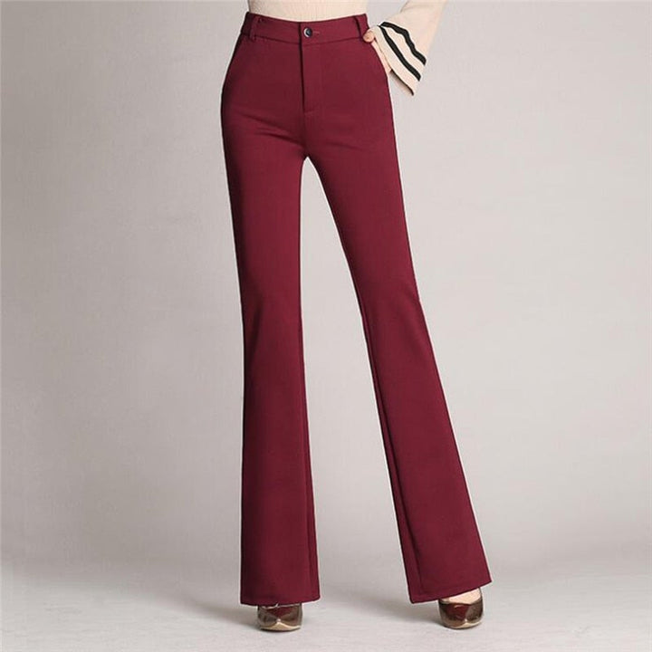 Tailored women's flared high-waist trousers, showcasing a sophisticated and professional office style.