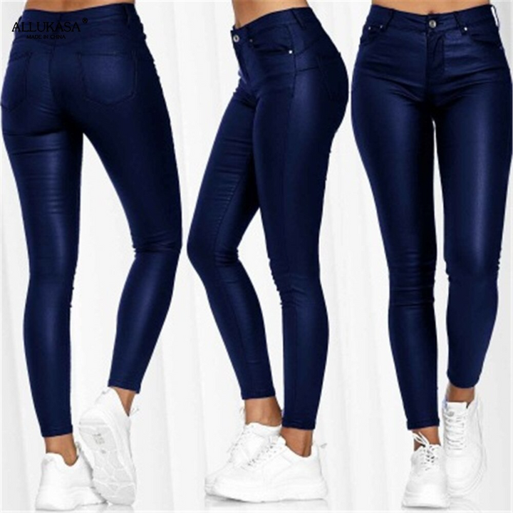 Elegant high waist leather skinny fit trousers for women. Stretch comfort, perfect for fall fashion.