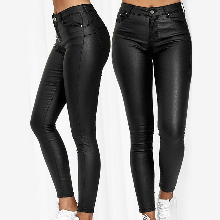 Elegant women's high waist stretch leather trousers. Slim fit, ideal for everyday and formal wear.