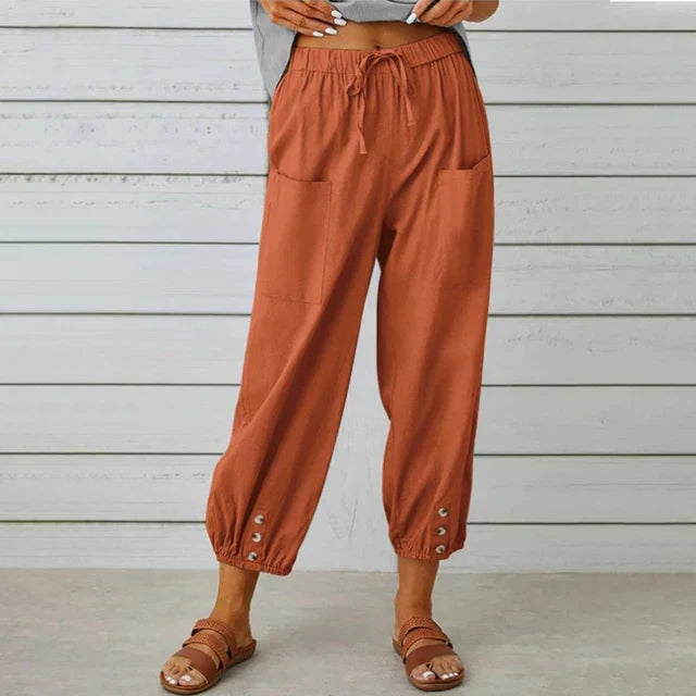 Chic women's high waist relaxed fit pants with a wide, flowy leg, ideal for versatile casual fashion.