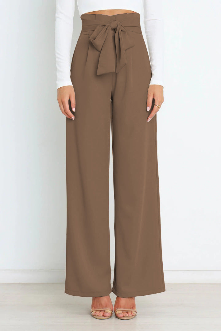 Stylish women's high-waisted wide-leg work pants. Professional office trousers for an elegant business look.