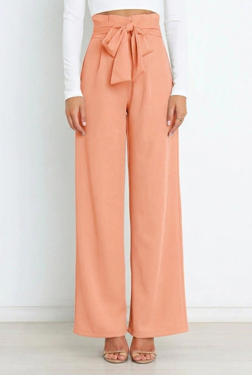 Comfortable women's high-waisted wide-leg work pants. Professional trousers suitable for office and elegant fashion.