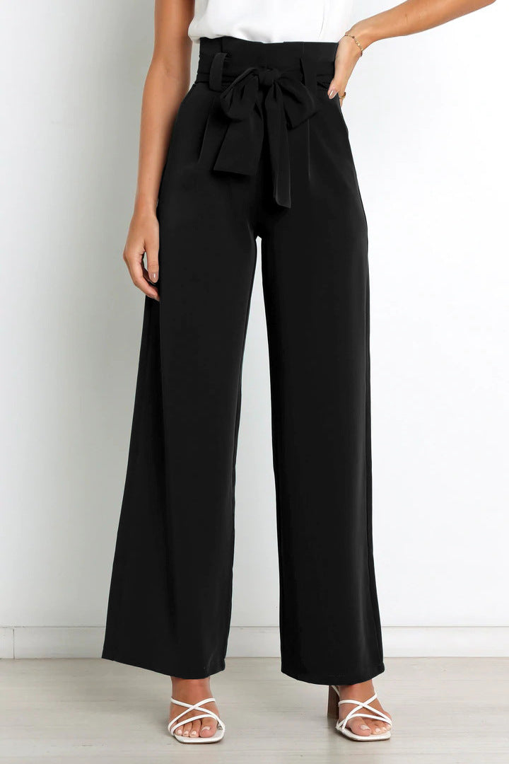 Effortless professional style: Women's high-waisted wide-leg work pants. Elegant and comfortable office trousers.