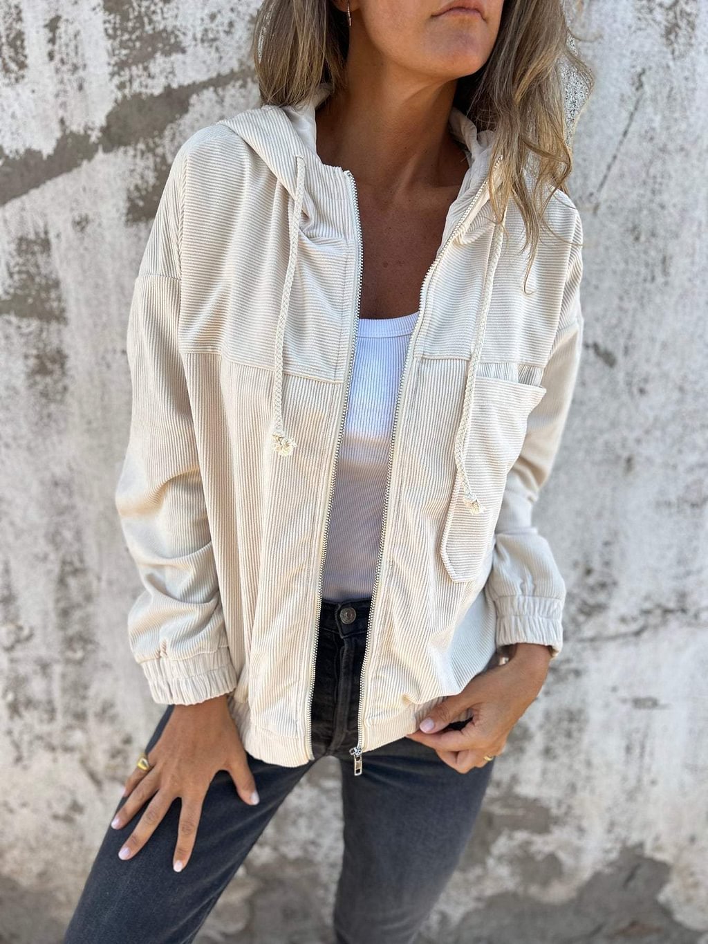 Comfortable women's hooded jacket, ideal for casual fall & spring fashion, adding chic street style to any outfit.