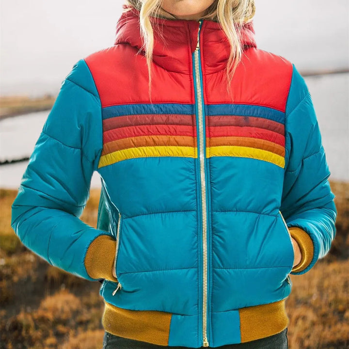 Casual women's hooded striped puffer jacket, a colorful retro winter coat for cold weather.