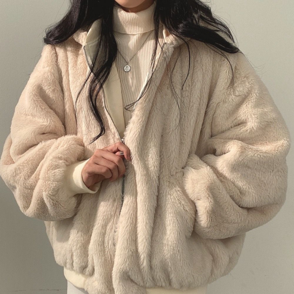 Women's reversible hooded winter jacket, Isla, providing warmth and style as essential fall outerwear.