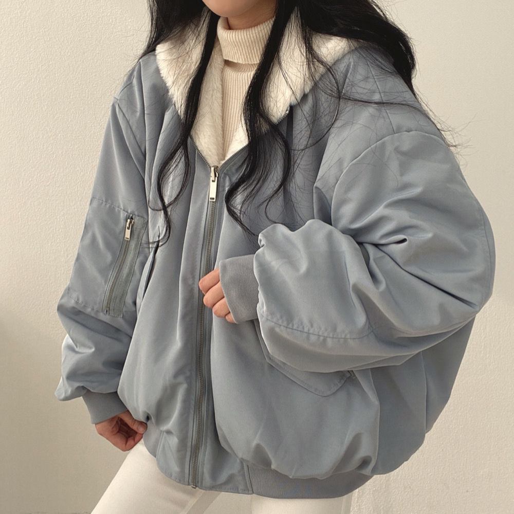Stylish women's reversible hooded winter coat, Isla, perfect versatile outerwear for casual or travel wear.