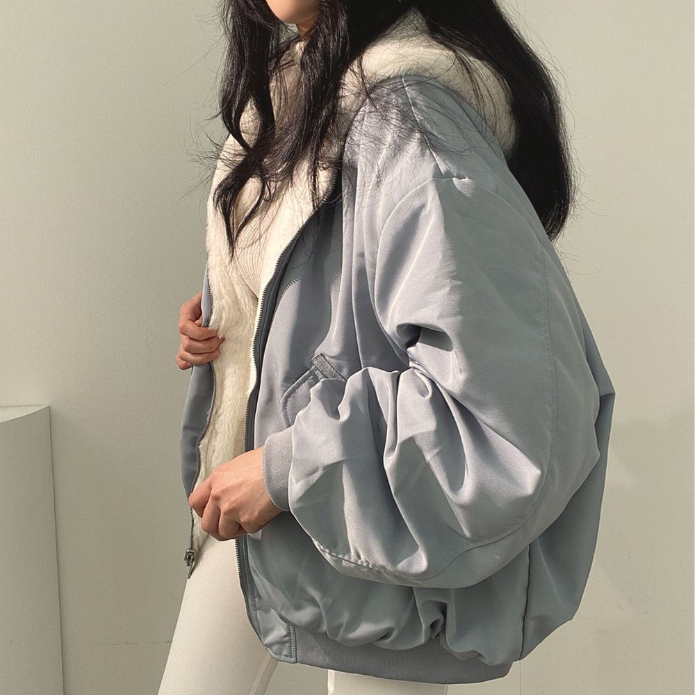 Comfortable women's reversible winter jacket, Isla, featuring a hood for extra warmth & versatile style.